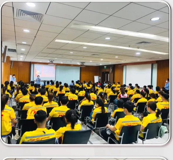Workers attending an employment-contract signing ceremony with Nhan Kiet